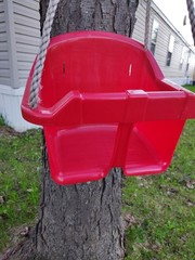 Red Plastic Toddler Swing With Rope