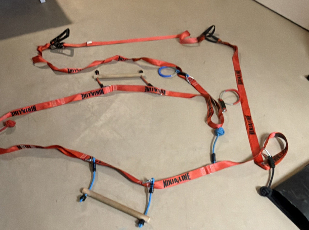 NinjaLine Outdoor Obstacle Course Slackline Kit with Rings and Bar.