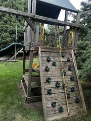 Rainbow Play Systems Wooden Outdoor Swing Set and trampoline
