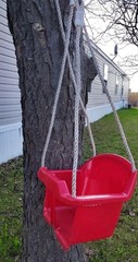 Red Plastic Toddler Swing With Rope