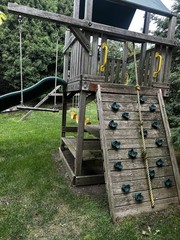 Rainbow Play Systems Wooden Outdoor Swing Set and trampoline