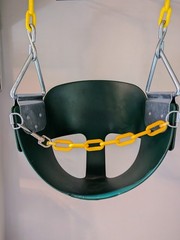 Green Full Bucket Toddler Swing Seat with Yellow Coated Chains.